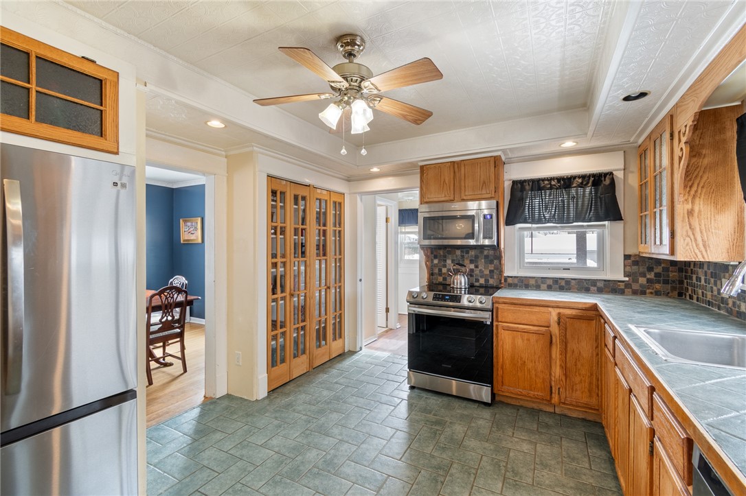 135 Wilson Street Arcadia, NY 14513 - Photo 7 of 27 The FLOOR TO CEILING PANTRY is huge! Keep everythi