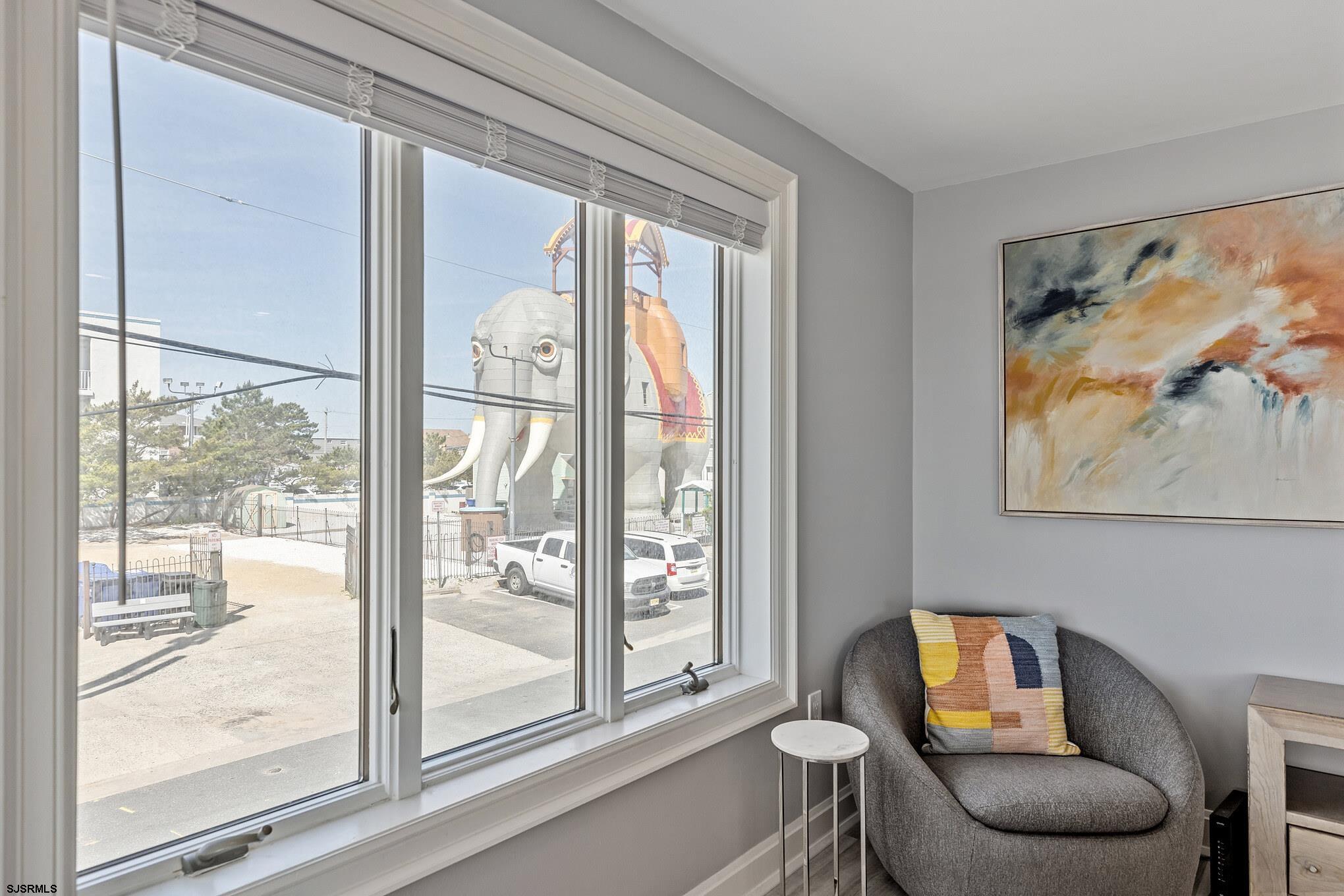 111 South Decatur Avenue Margate City, NJ 08402 - Photo 13 of 39 a living room with furniture and a window