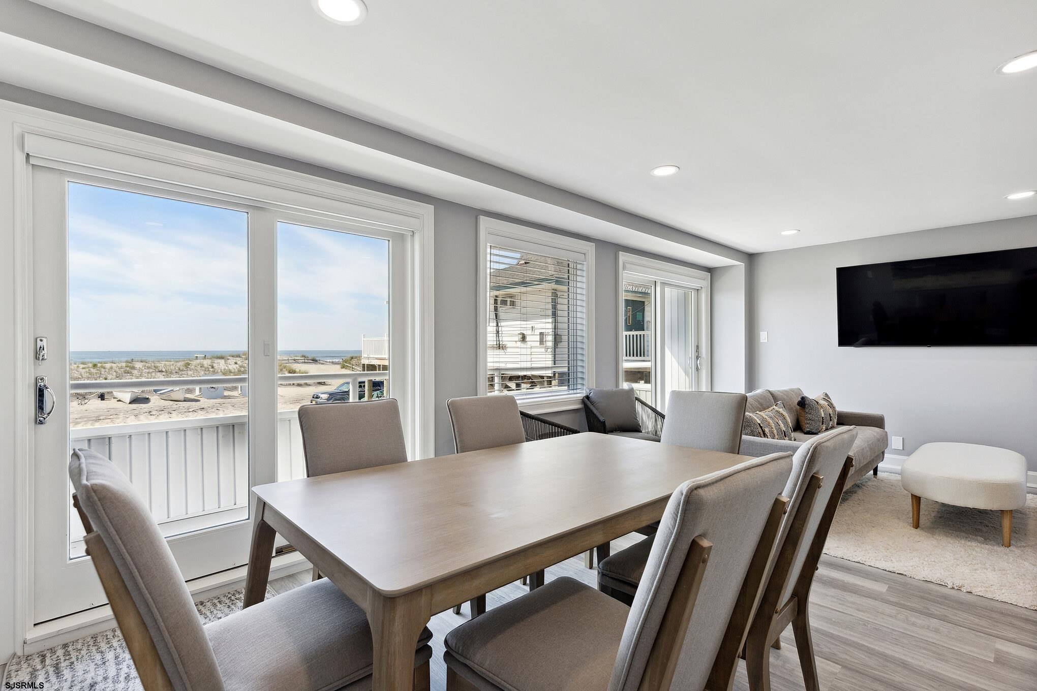 111 South Decatur Avenue Margate City, NJ 08402 - Photo 19 of 39 a view of a dining room with furniture window and wooden floor