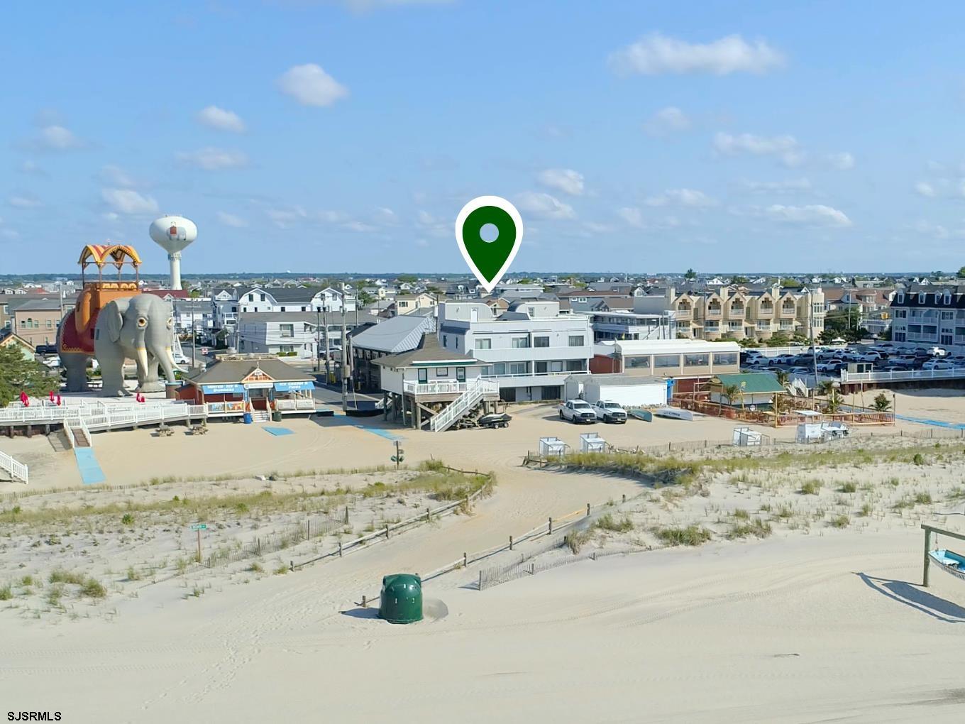 111 South Decatur Avenue Margate City, NJ 08402 - Photo 3 of 39 a view of a swimming pool with a slide