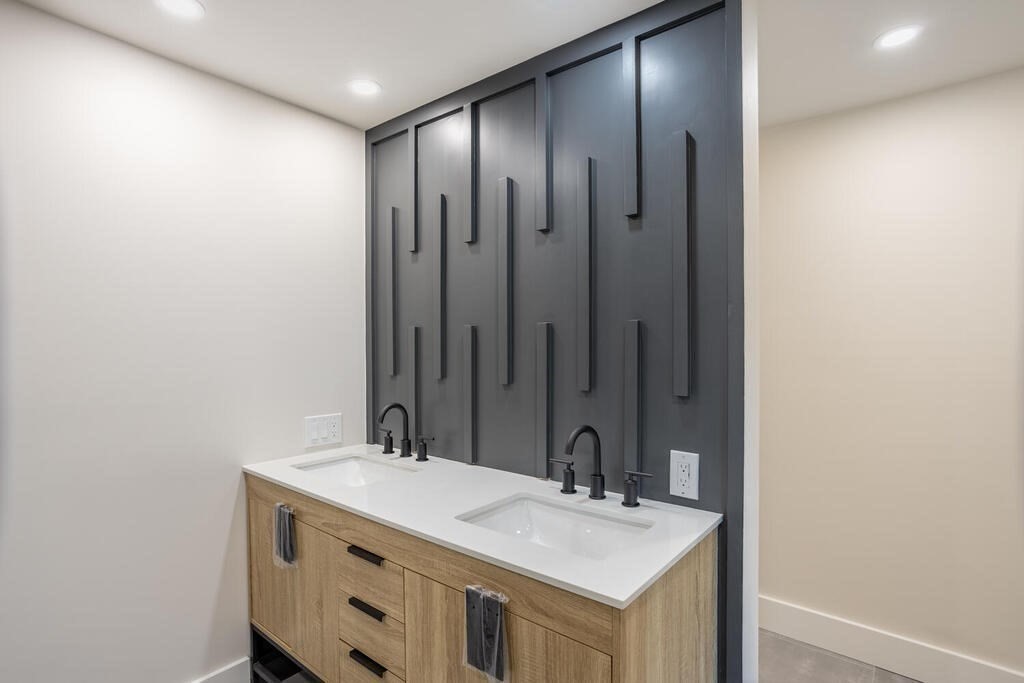 79 Bonham Road Dedham, MA 02026 - Photo 15 of 28 a bathroom with a sink and a mirror