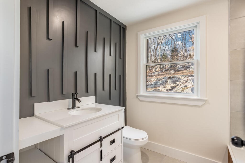 79 Bonham Road Dedham, MA 02026 - Photo 18 of 28 a bathroom with a sink toilet and shower