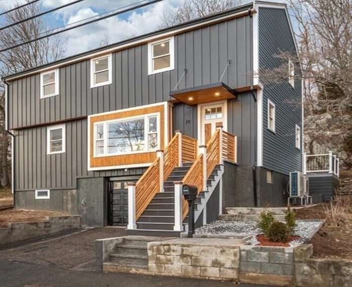 79 Bonham Road Dedham, MA 02026 - Photo 20 of 28 a front view of a house with garage