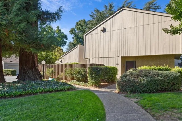 a house view with a garden space