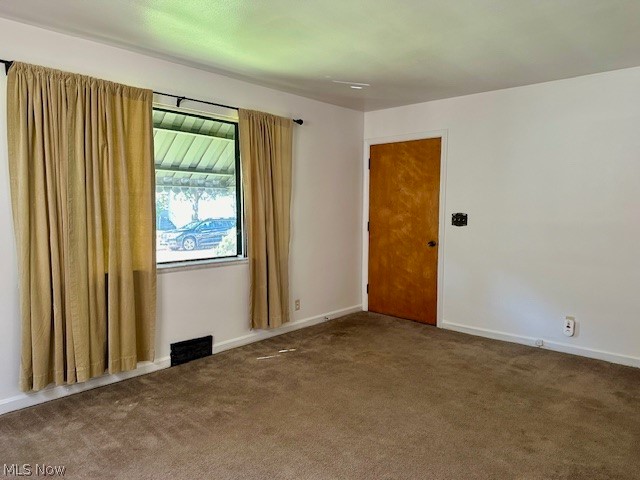 751 Thayer Street, Unit DOWN Akron, OH 44310 - Photo 2 of 25 Empty room featuring carpet flooring