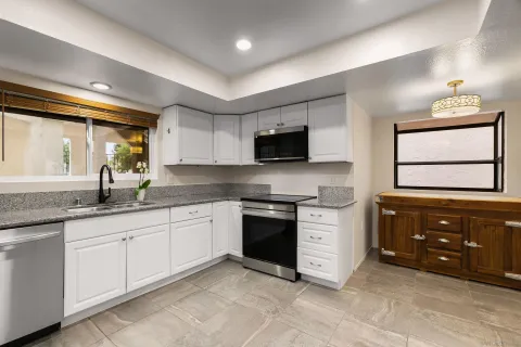 a front view of a building with garden