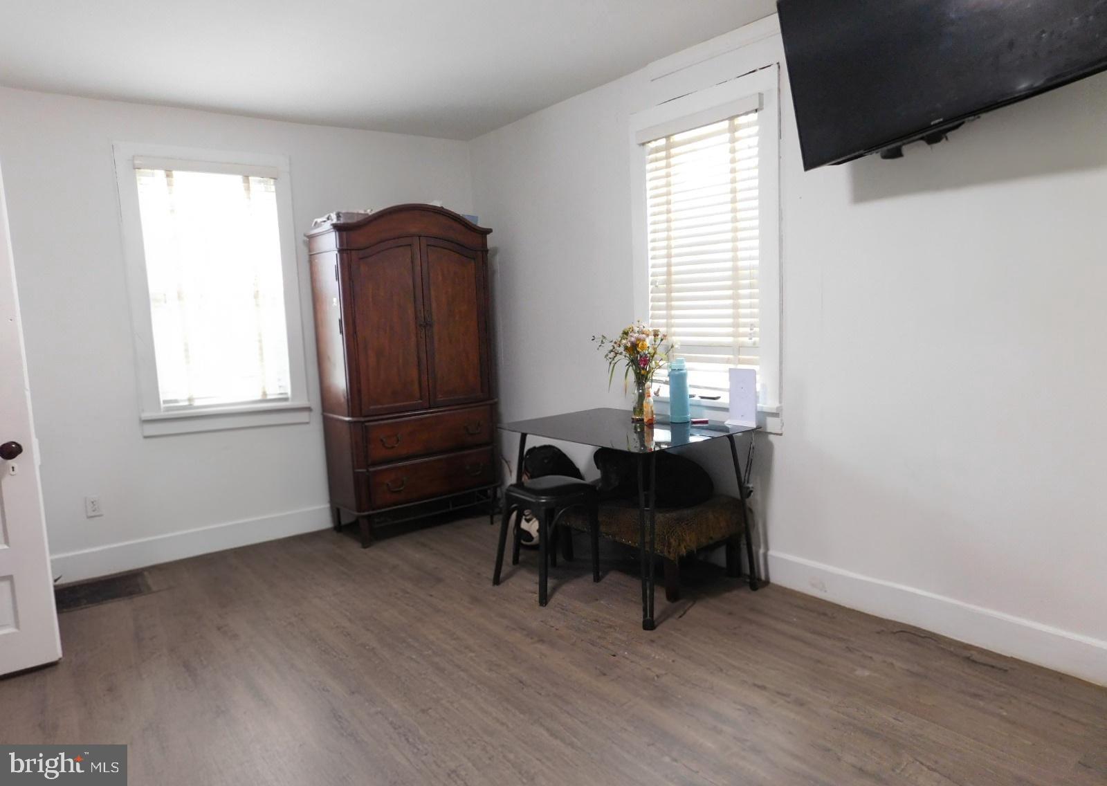 38777 Holmes Mill Road Hamilton, VA 20158 - Photo 4 of 14 wooden floor in an empty room with a window