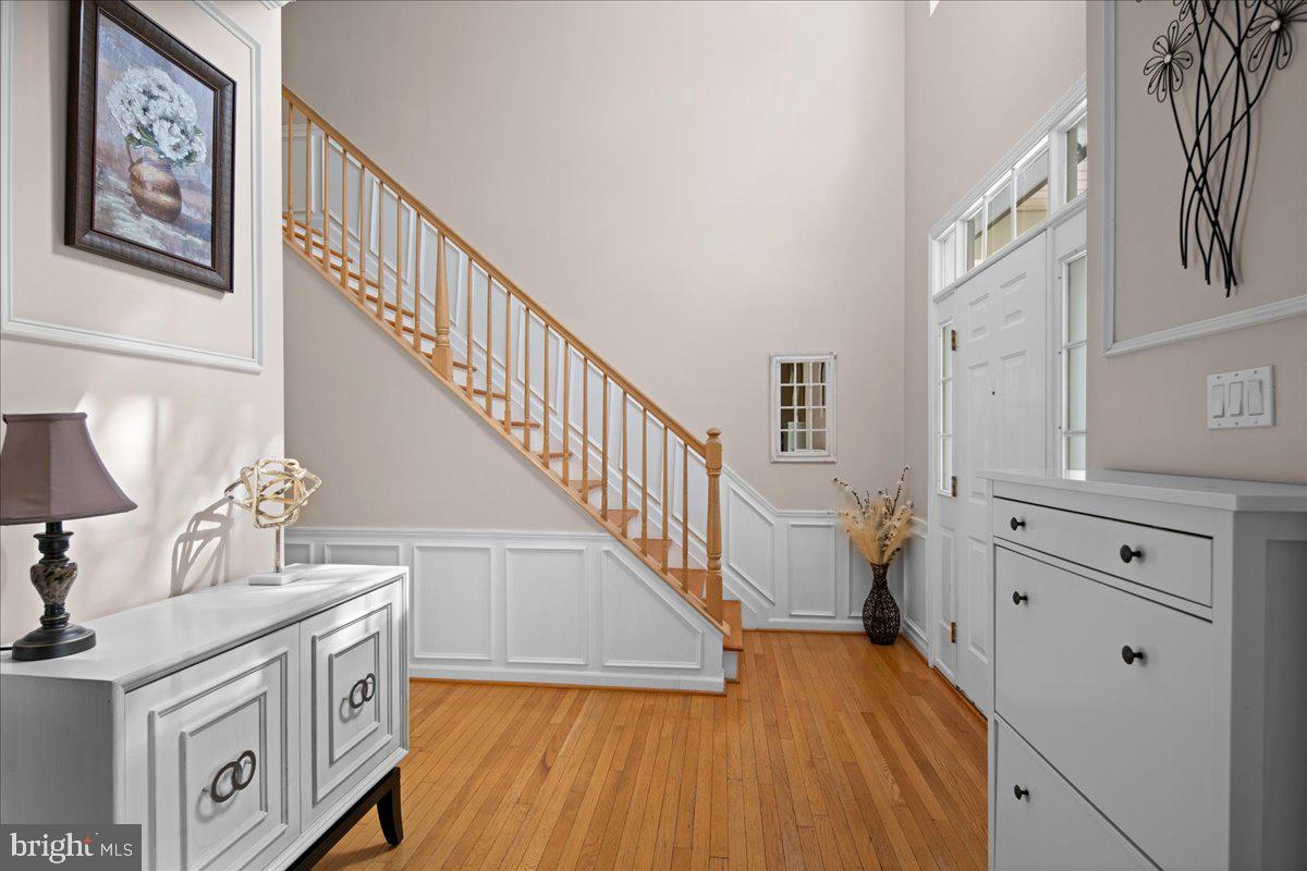 46 Navesink Drive Pennington, NJ 08534 - Photo 3 of 54 Wainscotting in foyer