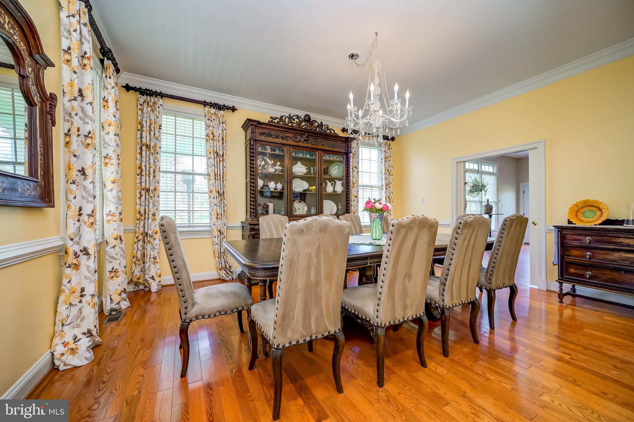12850 Highland Road Highland, MD 20777 - Photo 11 of 56 a view of a dining room with furniture a chandelier and wooden floor