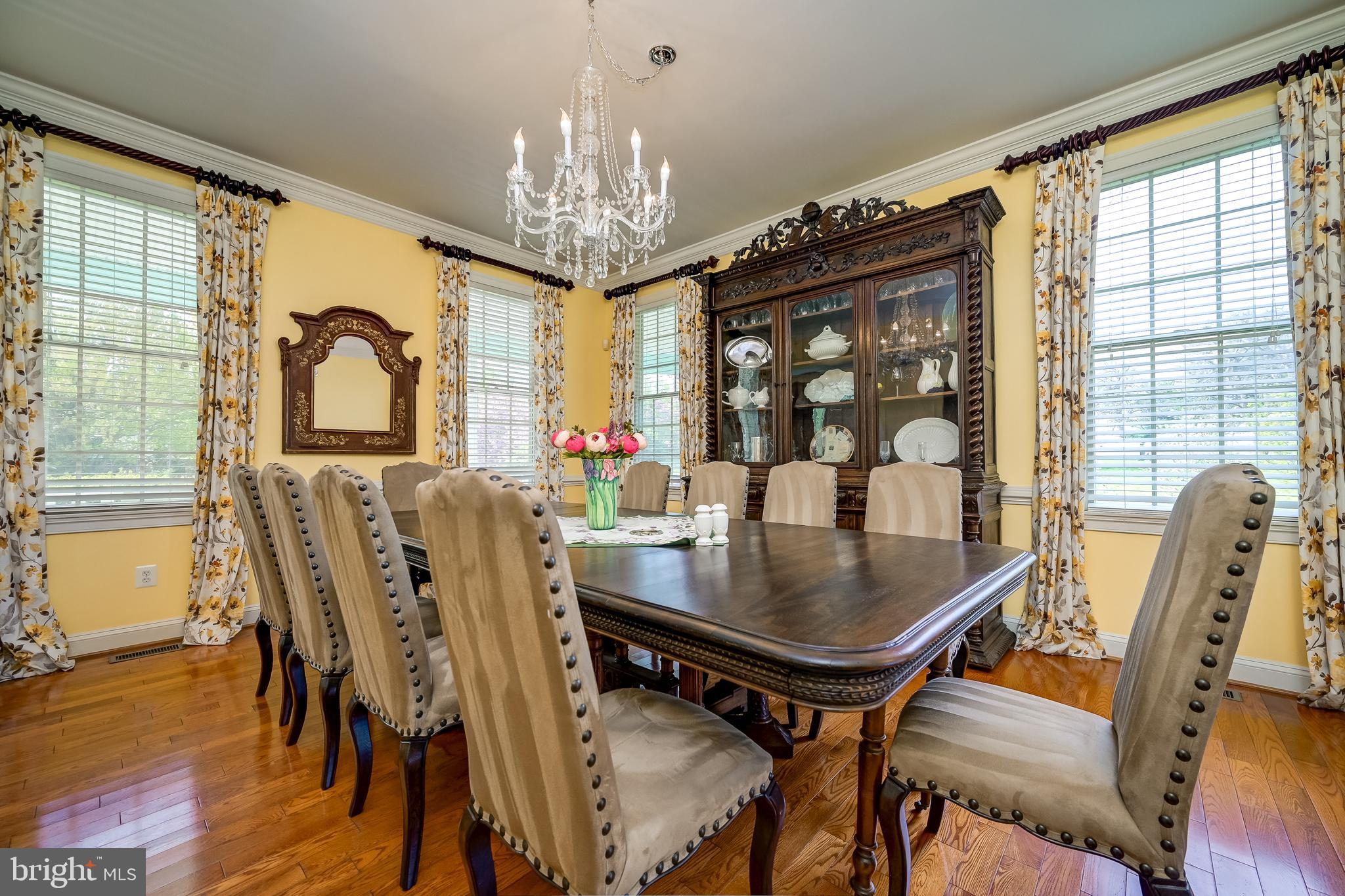 12850 Highland Road Highland, MD 20777 - Photo 12 of 56 a view of a dining room with furniture window and wooden floor