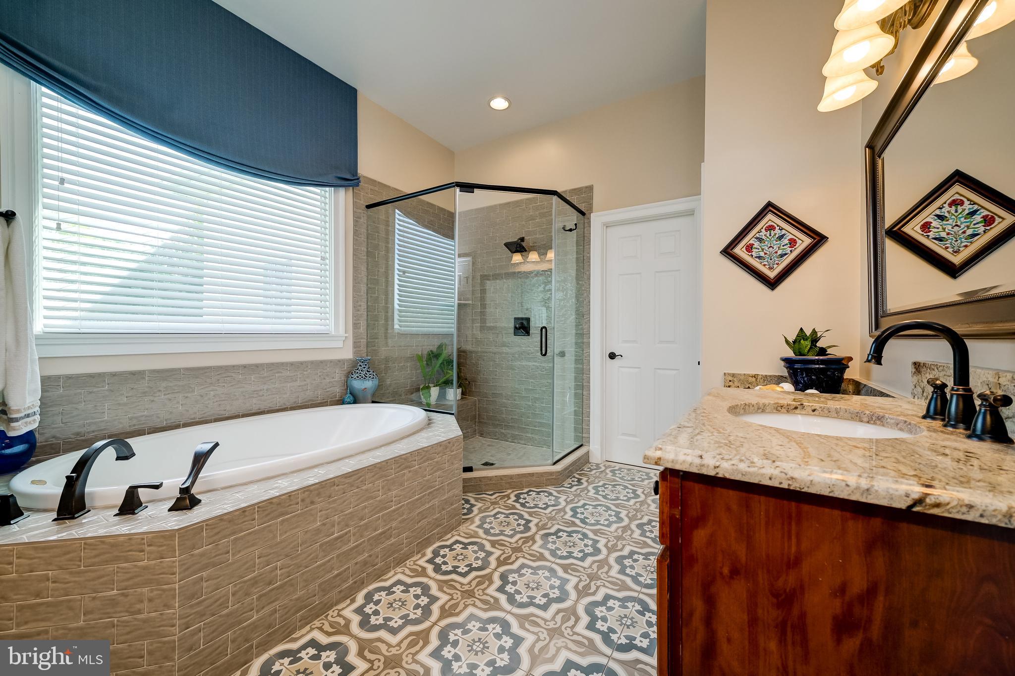 12850 Highland Road Highland, MD 20777 - Photo 27 of 56 a bathroom with a granite countertop sink and a mirror