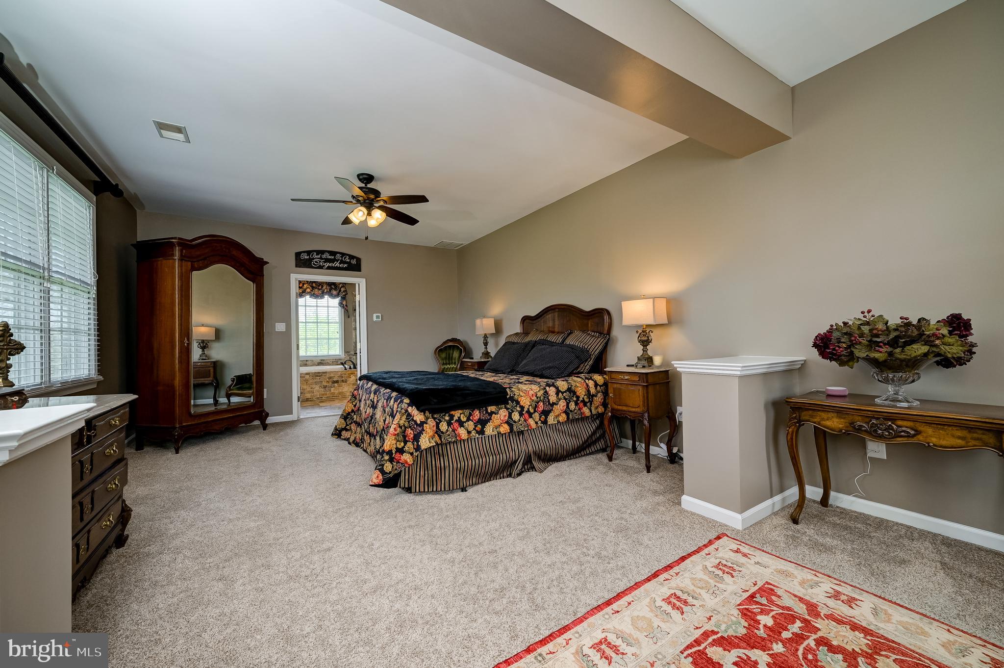12850 Highland Road Highland, MD 20777 - Photo 32 of 56 a bedroom with furniture and a chandelier