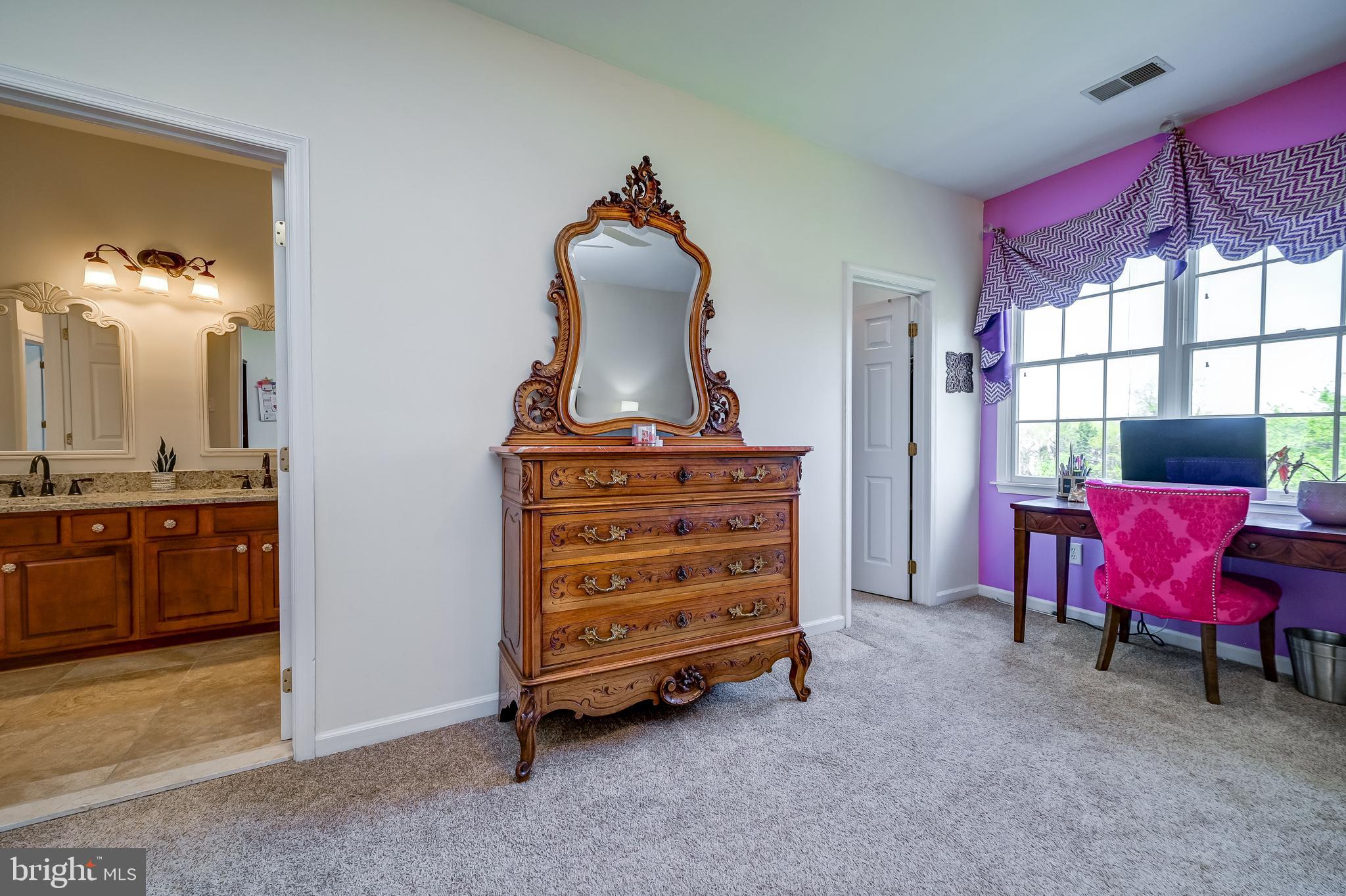 12850 Highland Road Highland, MD 20777 - Photo 37 of 56 a living room with furniture and a dresser
