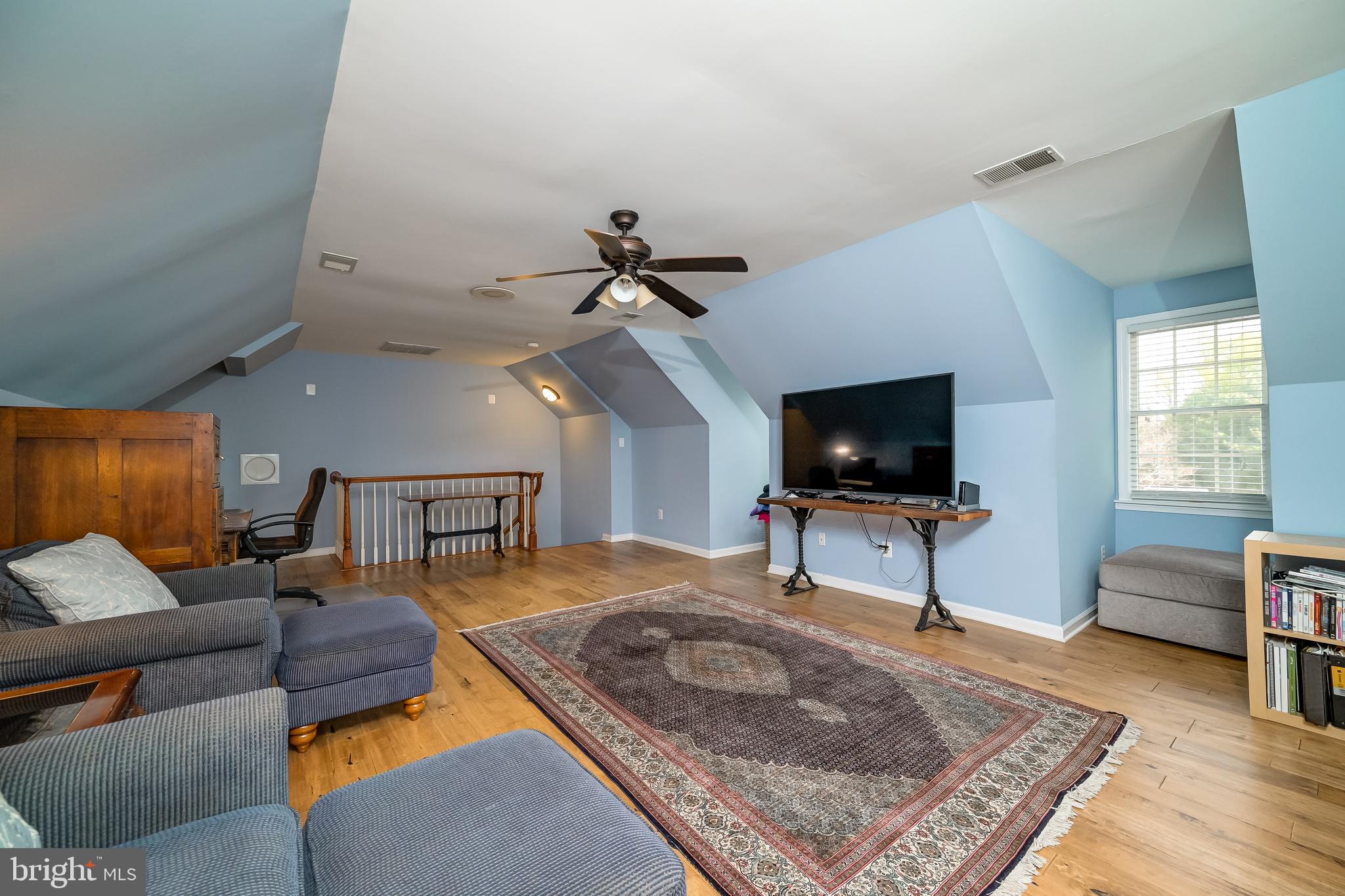12850 Highland Road Highland, MD 20777 - Photo 42 of 56 a living room with furniture and a flat screen tv