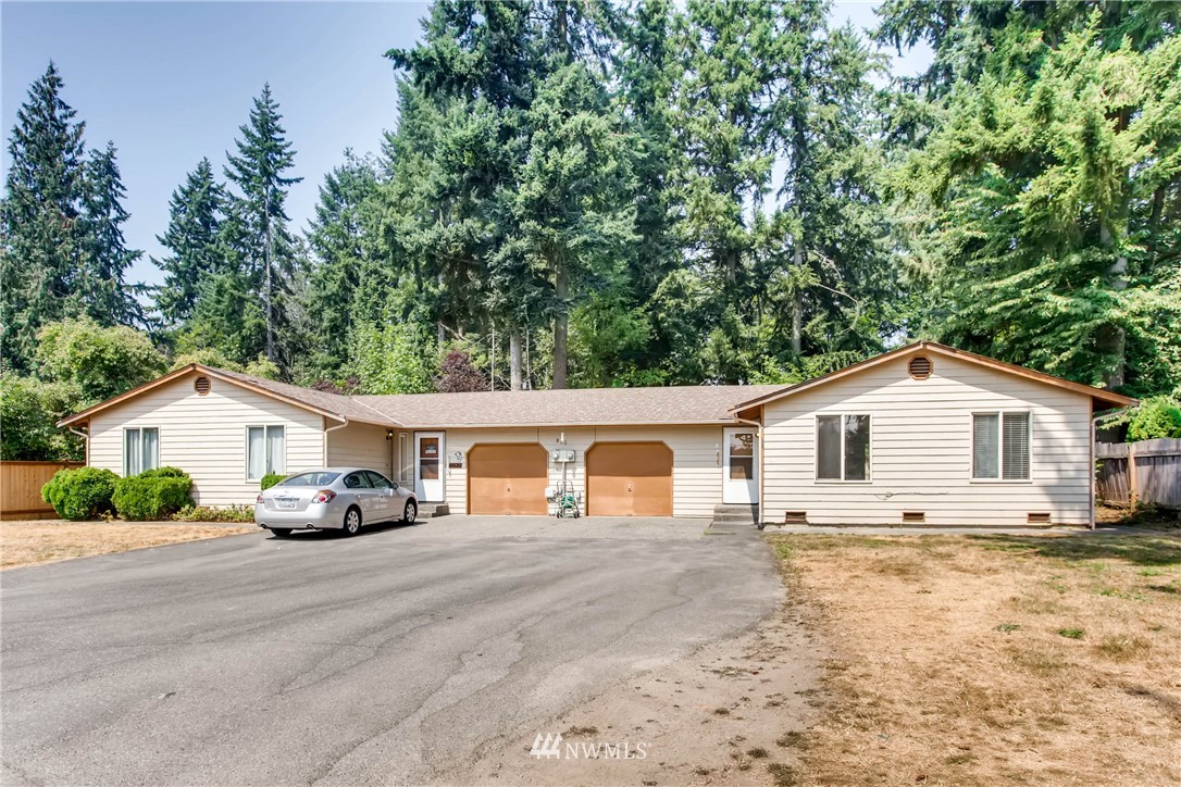 109 West Winesap Road Bothell, WA 98012 - Photo 1 of 22 a view of front a house with a yard