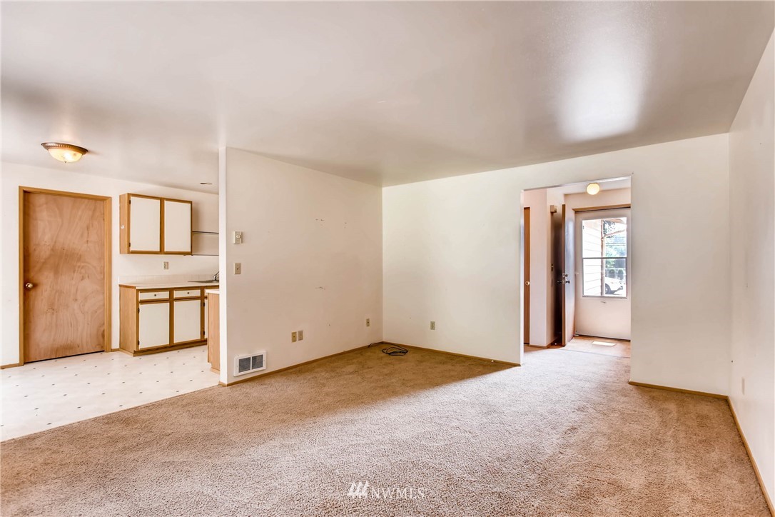 109 West Winesap Road Bothell, WA 98012 - Photo 5 of 22 a view of an empty room with a window
