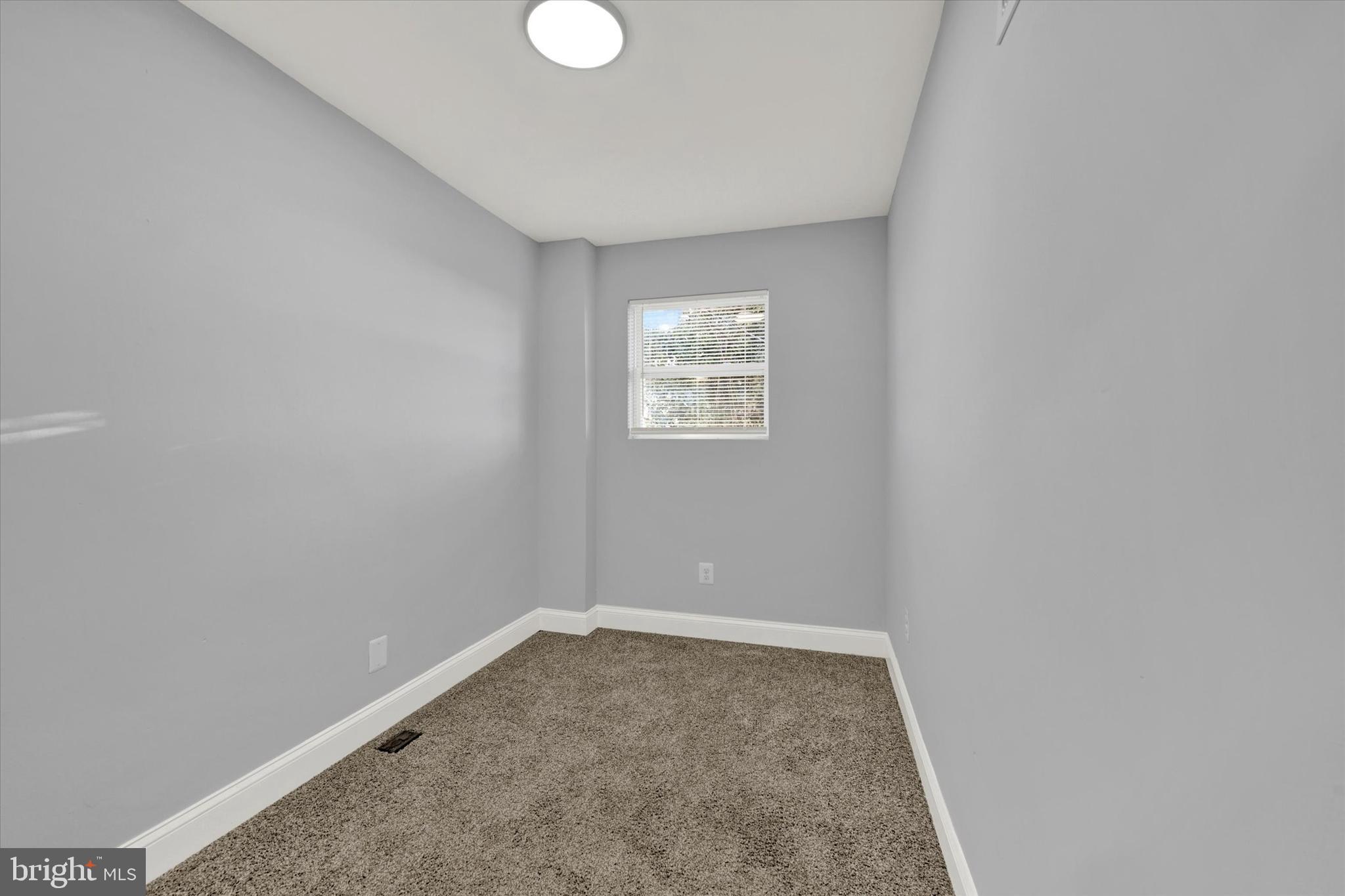 3105 Frisby Street Baltimore, MD 21218 - Photo 13 of 22 a view of room with window