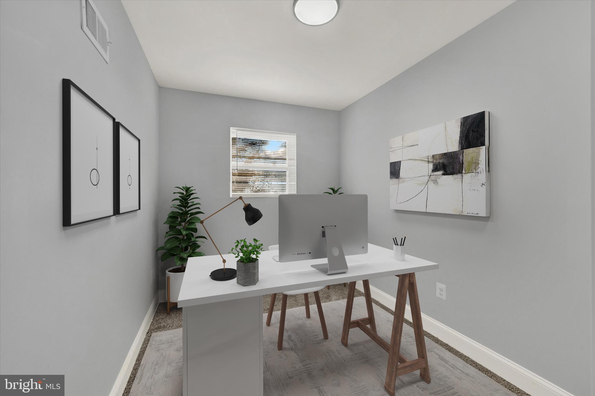 3105 Frisby Street Baltimore, MD 21218 - Photo 14 of 22 a workspace with furniture and window