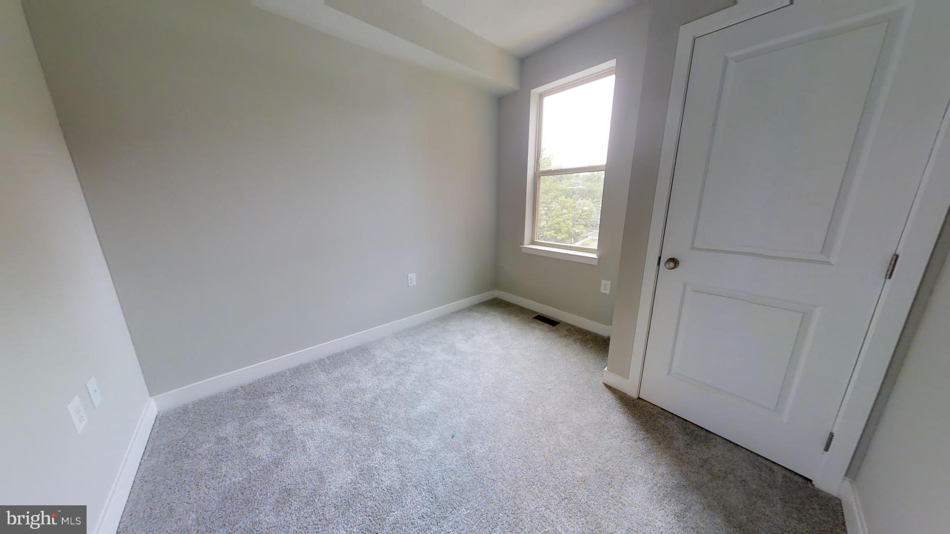 1262 Talbert Street Southeast, Unit A Washington, DC 20020 - Photo 13 of 20 a view of an empty room with a window