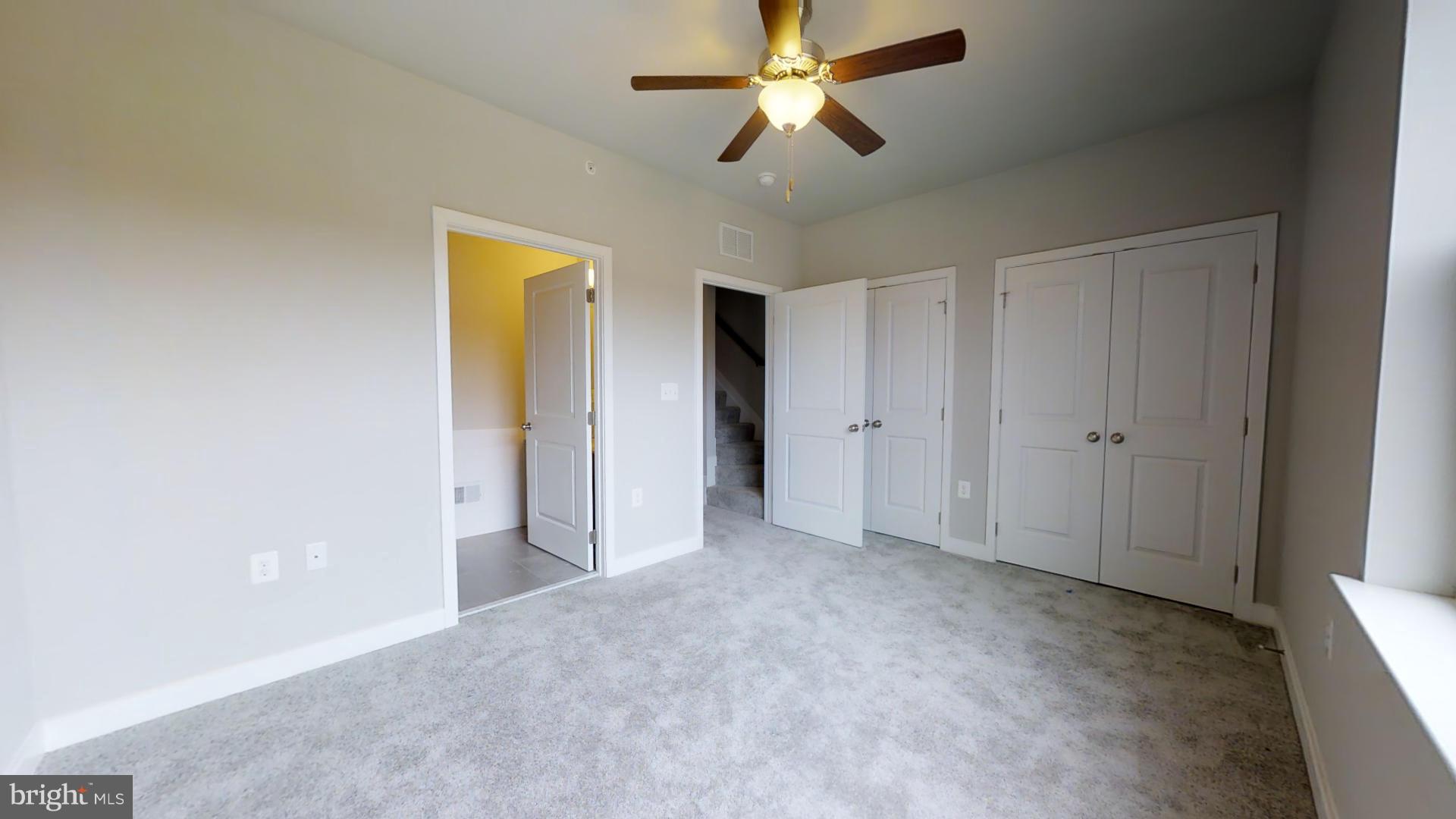 1262 Talbert Street Southeast, Unit A Washington, DC 20020 - Photo 7 of 20 a view of empty room with a ceiling fan