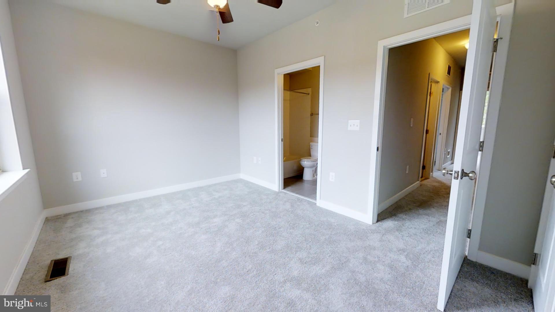 1262 Talbert Street Southeast, Unit A Washington, DC 20020 - Photo 8 of 20 an empty room with a bathroom
