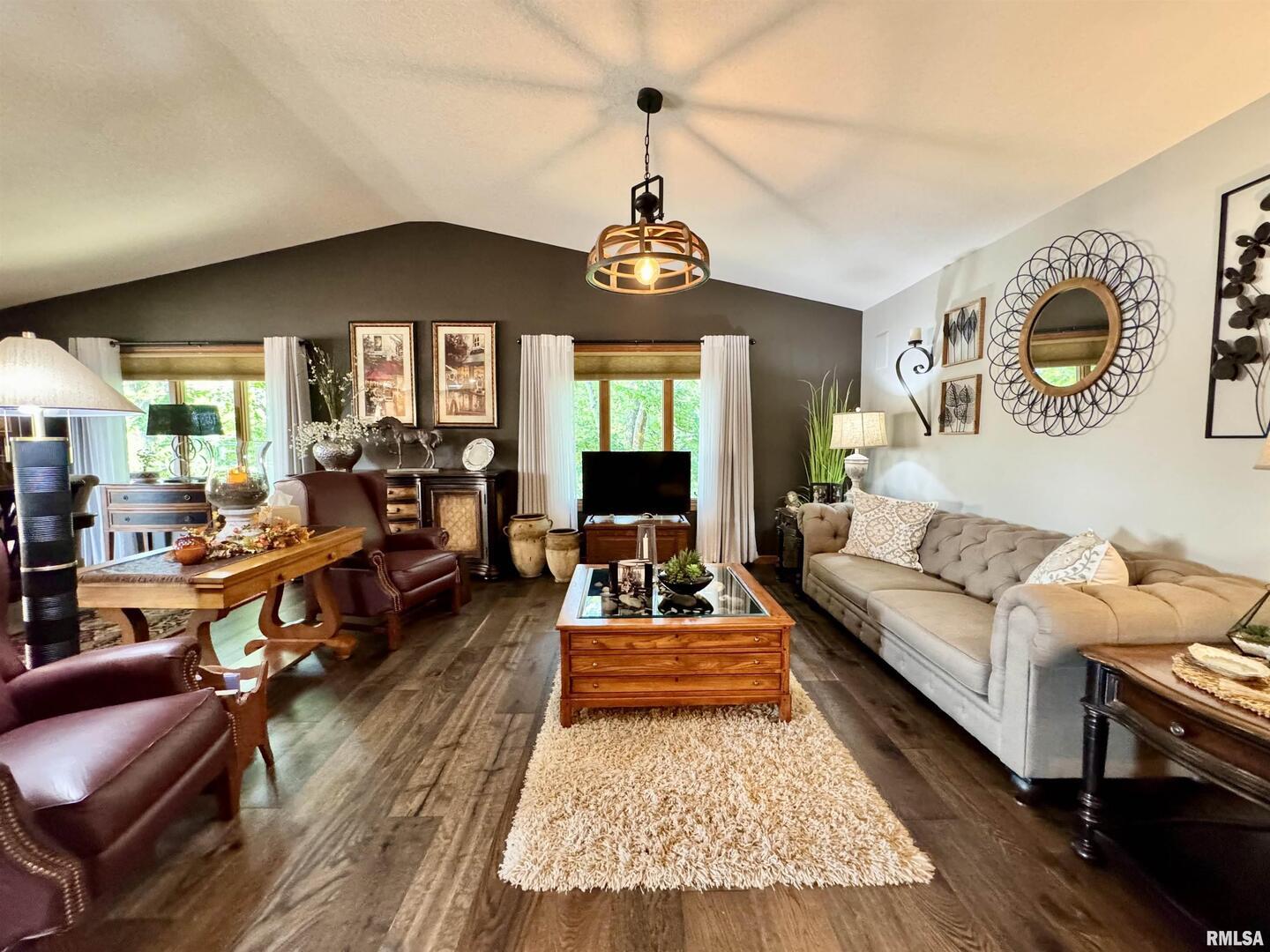 102 5th Street, Unit 6 Fulton, IL 61252 - Photo 13 of 42 a living room with furniture and a chandelier