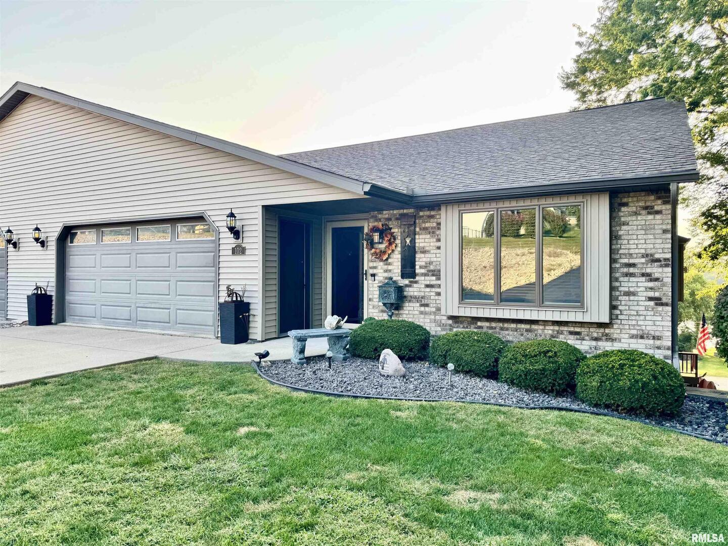 102 5th Street, Unit 6 Fulton, IL 61252 - Photo 2 of 42 a front view of house with yard and green space