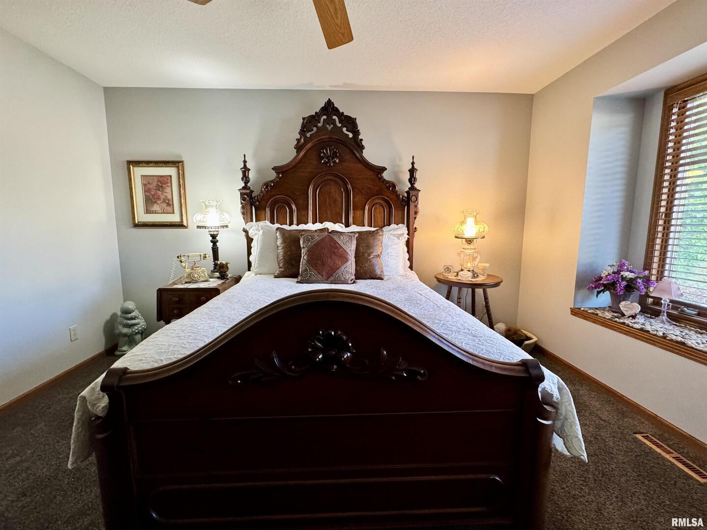 102 5th Street, Unit 6 Fulton, IL 61252 - Photo 24 of 42 a living room with furniture and a window