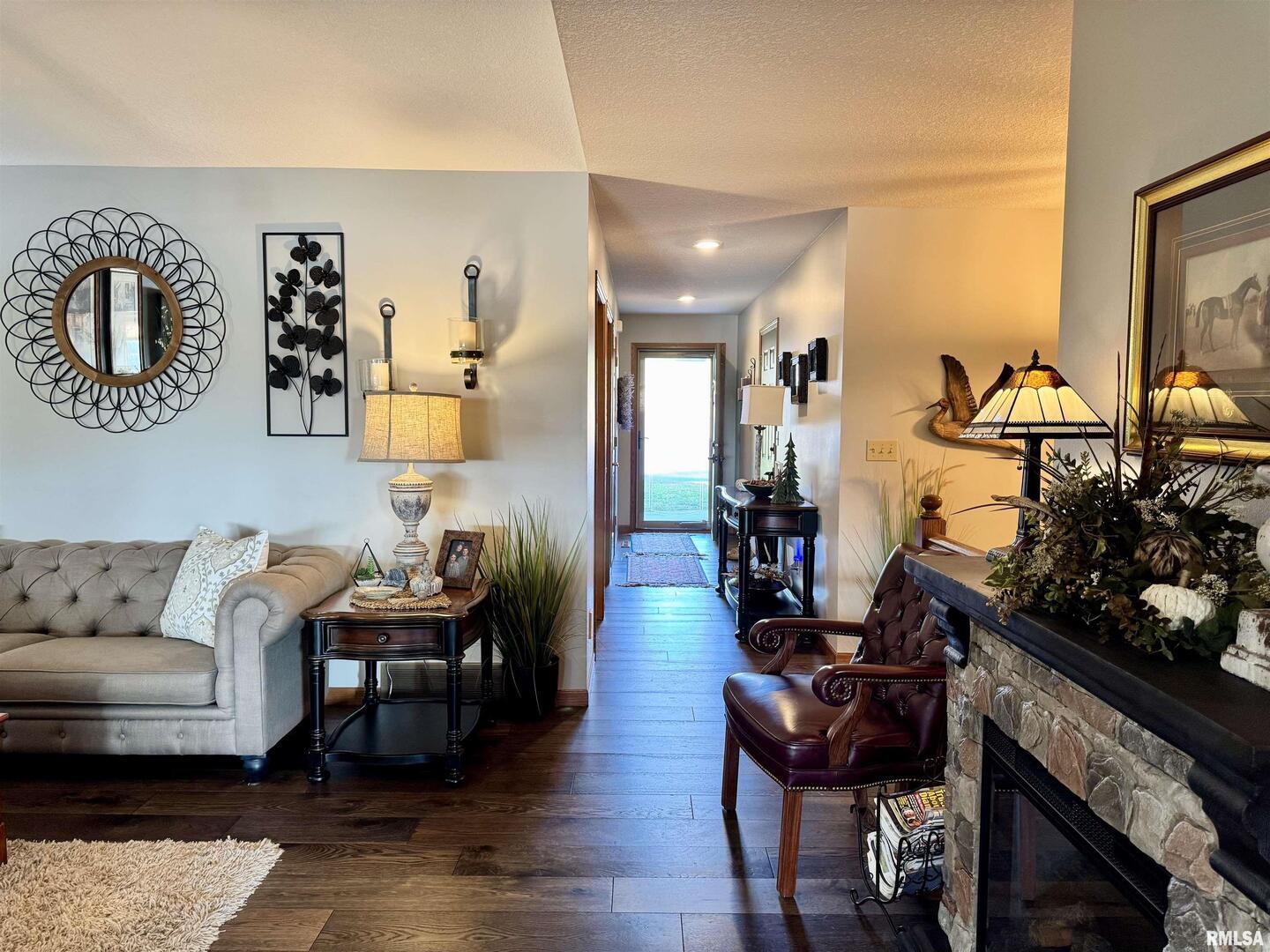102 5th Street, Unit 6 Fulton, IL 61252 - Photo 9 of 42 a living room with furniture and wooden floor
