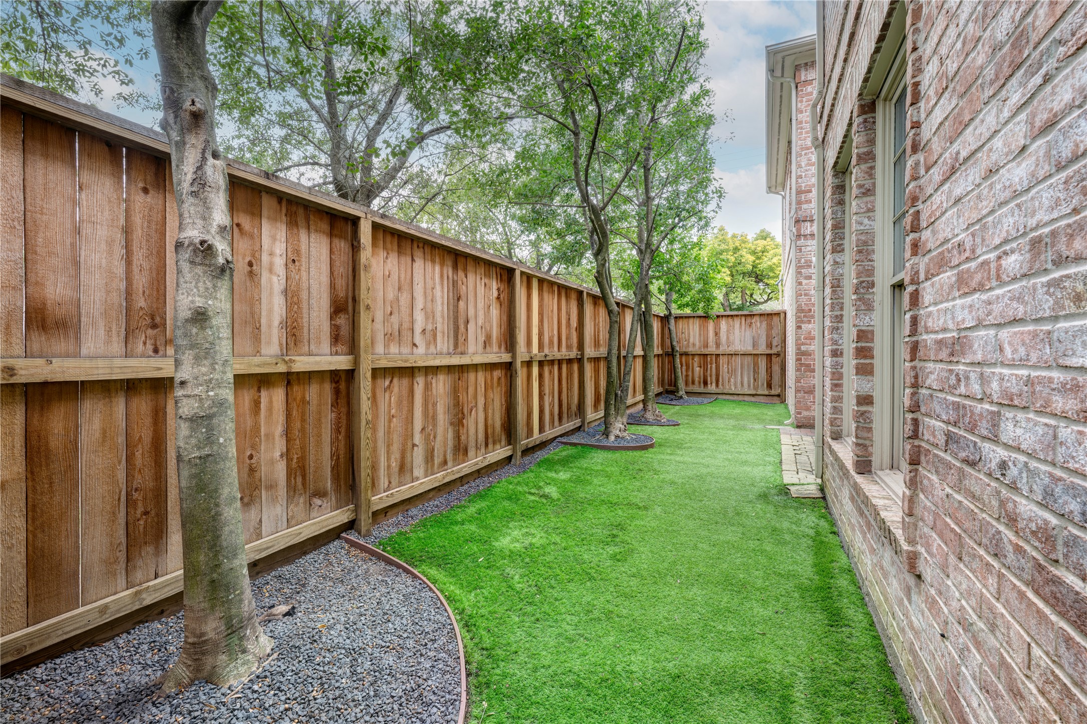 2740 Wroxton Road West University Place, TX 77005 - Photo 16 of 28 An alternative view of the turfed side yard.