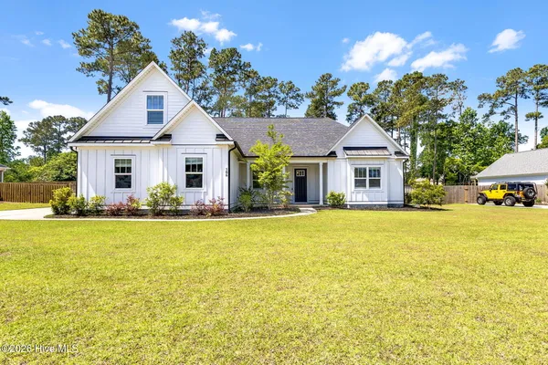 $660,000 | 506 Crown Pointe Drive, Hampstead, NC 28443