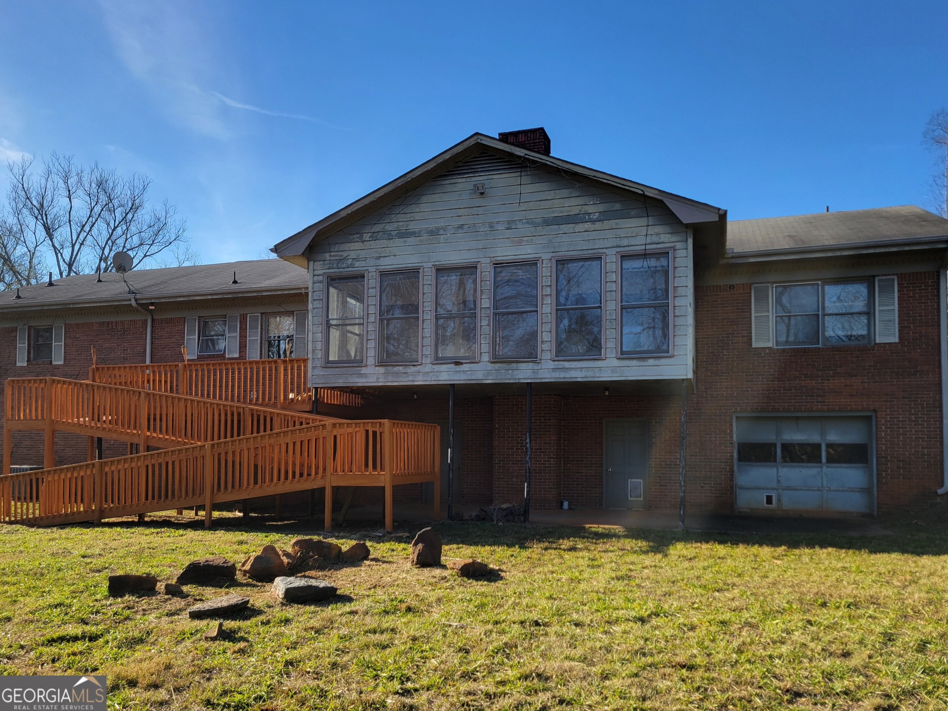 788 Harrison Mill Road Winder, GA 30680 - Photo 19 of 19 a view of a house with a yard