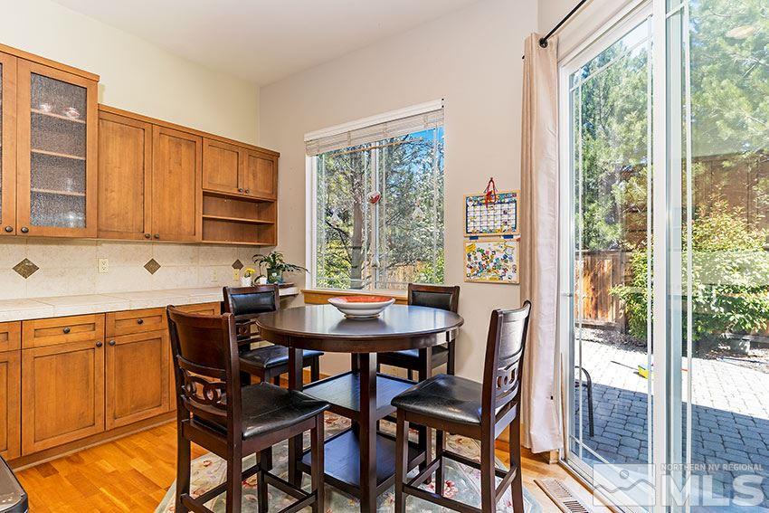 4971 Fall Creek Court Reno, NV 89519 - Photo 10 of 21 a view of a dining room with furniture window and outside view
