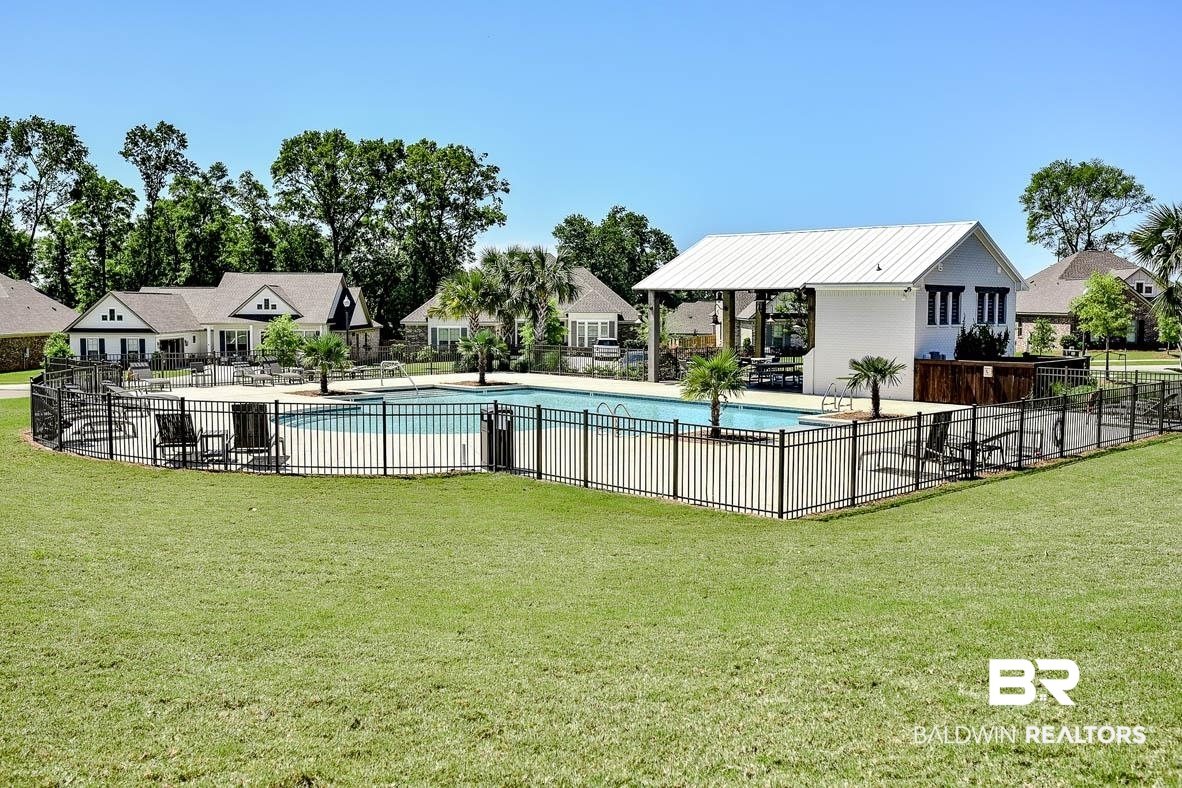 388 Garrison Boulevard Fairhope, AL 36532 - Photo 27 of 34 View of pool with a patio and a yard
