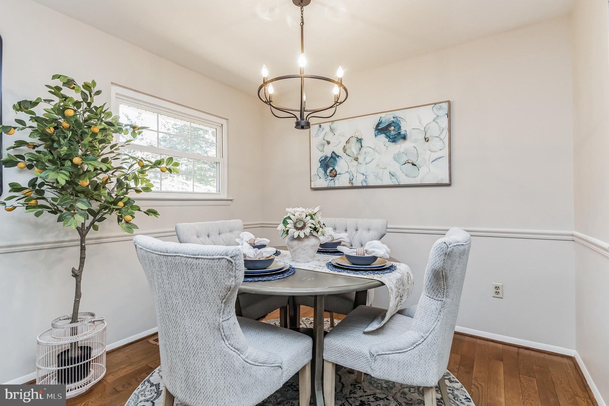24300 Log House Road Gaithersburg, MD 20882 - Photo 10 of 34 I love the lighting in the dining room