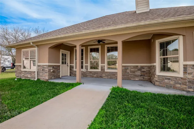 a view of a house with garden