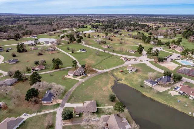 an aerial view of a house with a outdoor space