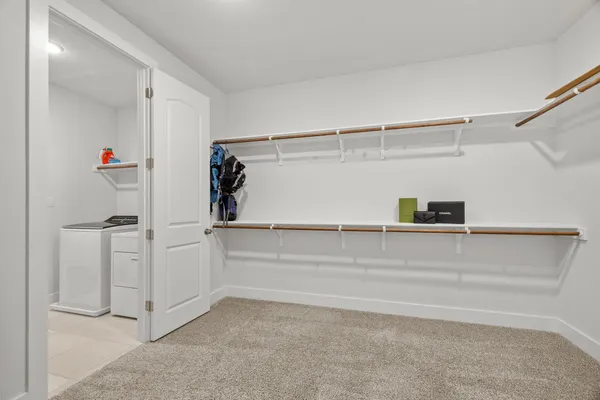 a view of an empty walk in closet