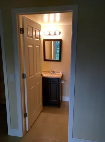 a house with trees in the background