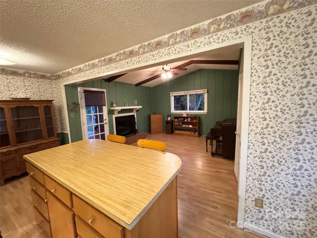 a living room with a couch and a fireplace