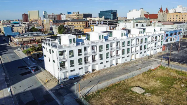 a large building with a lot of trees