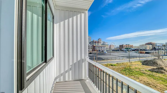 a view of swimming pool from a balcony
