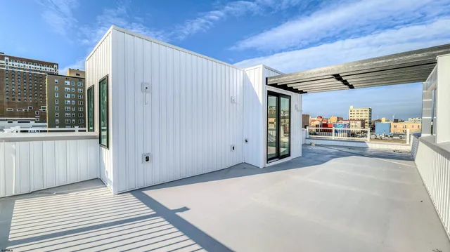 a view of a kitchen from a balcony