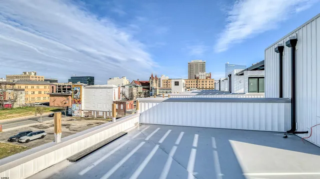 a view of a building with a street