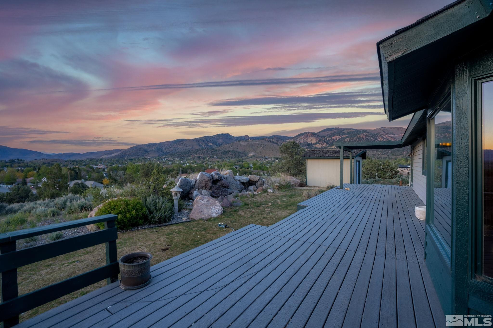 15350 Yankee Blade Road Reno, NV 89521 - Photo 25 of 27 a view of a balcony with wooden floor and city view