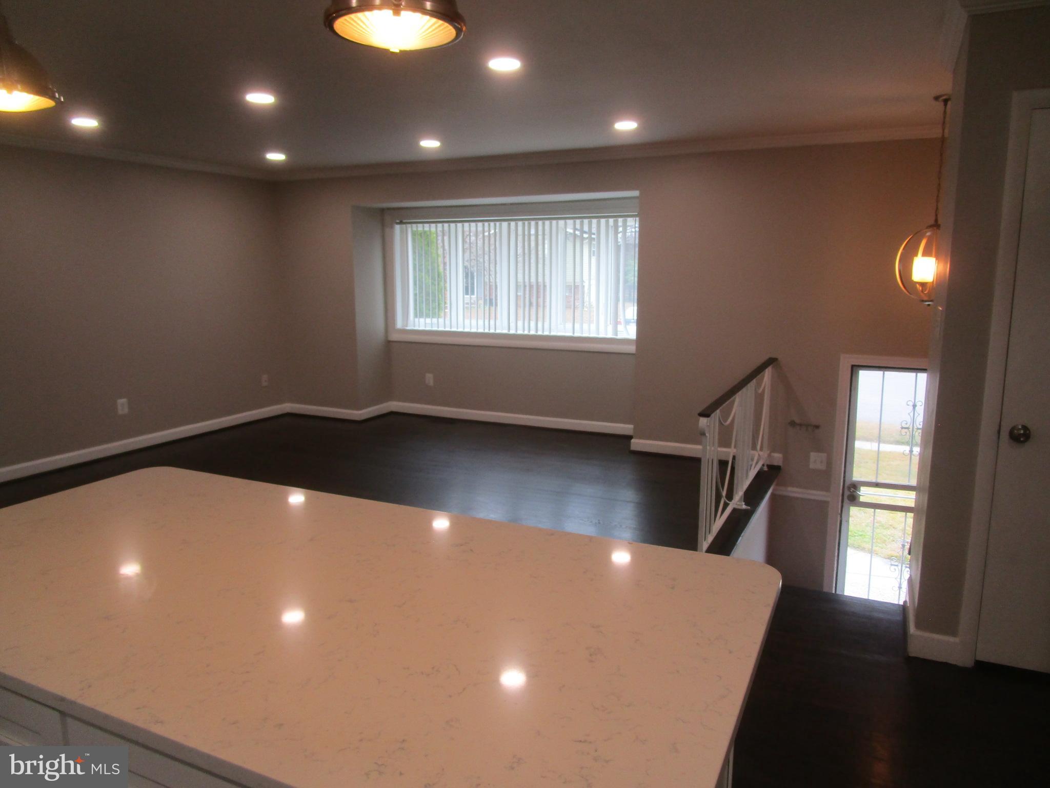 1908 Fenwood Avenue Oxon Hill, MD 20745 - Photo 13 of 15 a view of a livingroom with a staircase