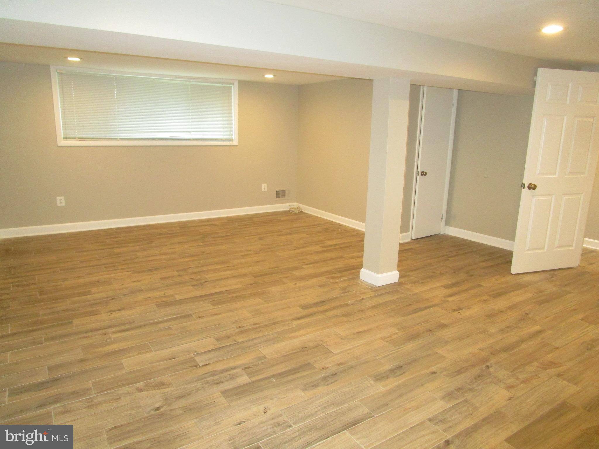 1908 Fenwood Avenue Oxon Hill, MD 20745 - Photo 10 of 15 a view of empty room with wooden floor