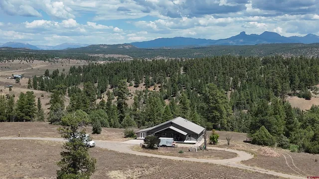 a lake view with a mountain in the background