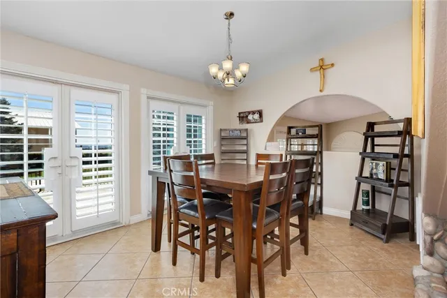 a kitchen with stainless steel appliances kitchen island granite countertop a sink and cabinets