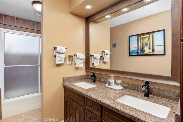 a view of a bedroom with washer and dryer